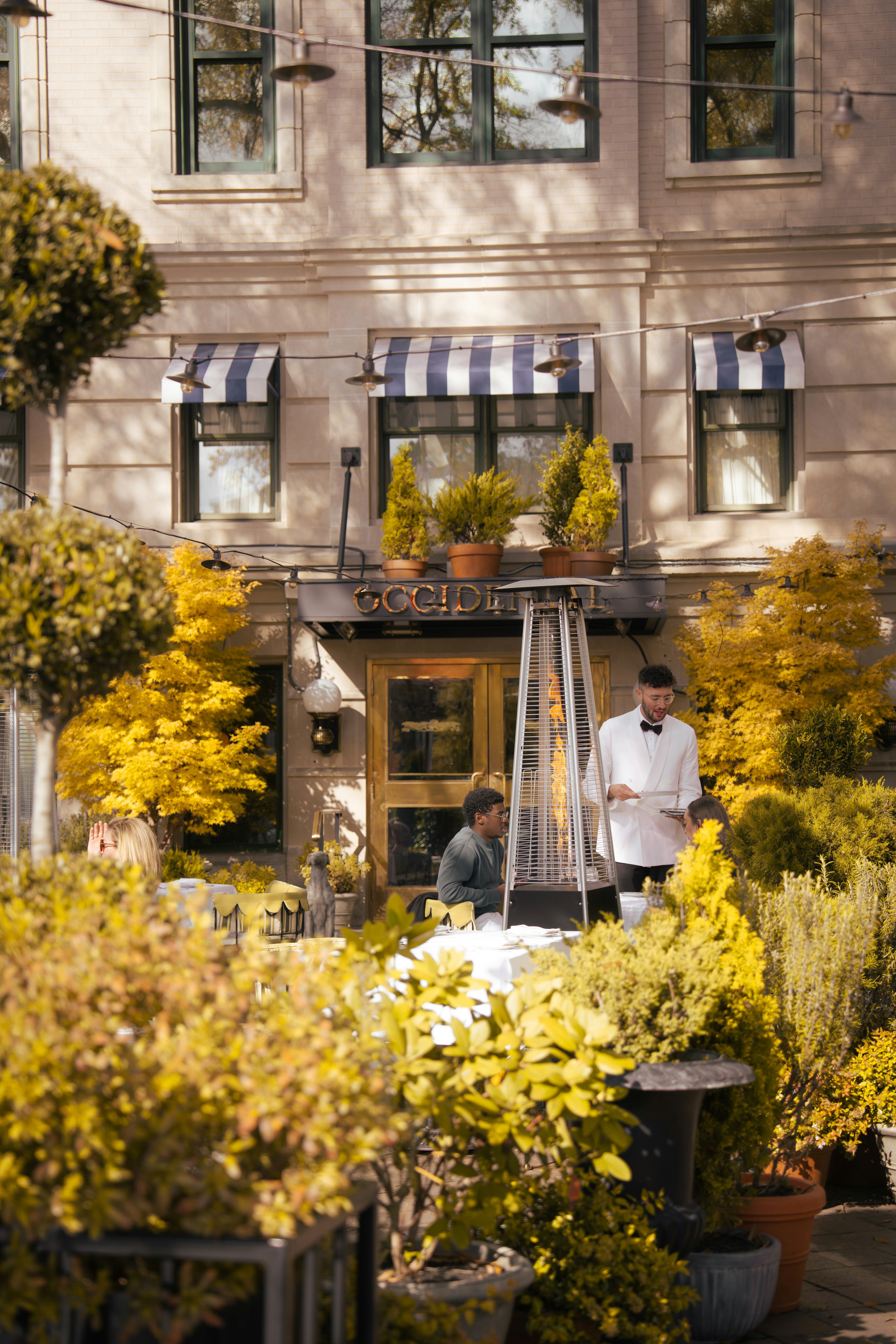 Happy wait staff and team showing service flow